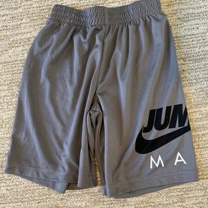 grey boys basketball shorts with nike logo in good condition
